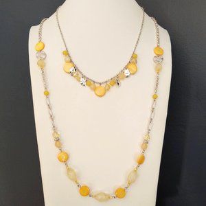 Pair of yellow and silver layering necklaces